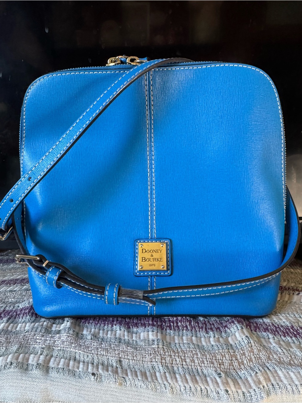 Dooney & Bourke Bright Blue Leather Crossbody with Gold Plaque